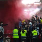A flare is set of by Derry city supporters at a recent match at Brandywell. Photograph: George Sweeney