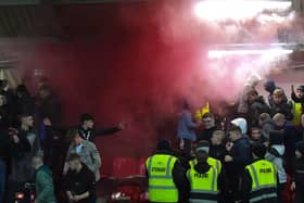 A flare is set of by Derry city supporters at a recent match at Brandywell. Photograph: George Sweeney