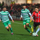Shamrock Rovers pair Dylan Watts and Neil Farrugia close in onDerry City’s Ben Doherty.  Photo: George Sweeney. DER2307GS – 95