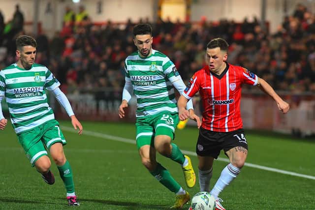 Shamrock Rovers pair Dylan Watts and Neil Farrugia close in onDerry City’s Ben Doherty.  Photo: George Sweeney. DER2307GS – 95