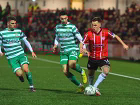 Shamrock Rovers pair Dylan Watts and Neil Farrugia close in onDerry City’s Ben Doherty.  Photo: George Sweeney. DER2307GS – 95