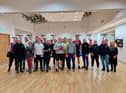 Participants, trainers, organisers and CALMS representatives at St Mary's ABC in Creggan on Wednesday night ahead of the CALMS Fight Night at the Guildhall.