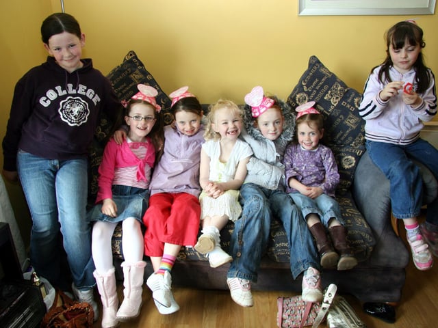 Birthday party in full swing as megan takes time out to pose for the camera at her 7th birthday.0013JML : Parties in Derry in Spring 2006.