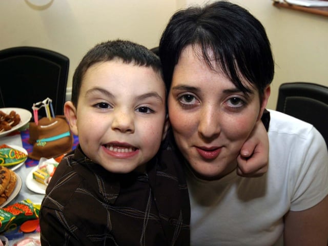 Declan smiles for the camera with his mum Kerrylee 0003/JML : Parties and celebrations January 2006: Declan.
