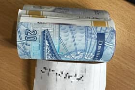 A bundle of money and telephone number a Derry republican claims were deposited in his car.