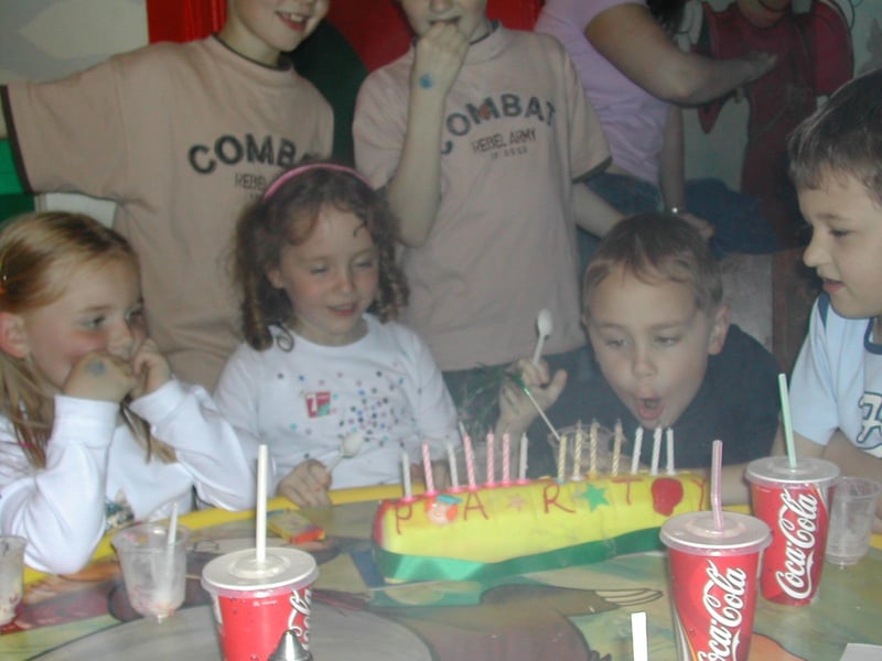 Seanan and Seamus blowing out the candles at their seventh birthday party