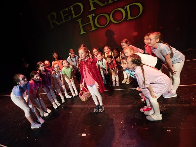 Kate Hribar as Little Red Riding Hood with her friends from the forest during the Foyle School of Speech and Drama's summer production at the Millennium Forum, Derry.