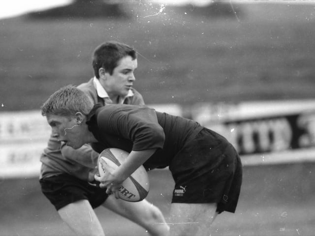 A St. Peter's player is stopped in his tracks during the school's first ever rugby union clash with St. Joseph's.