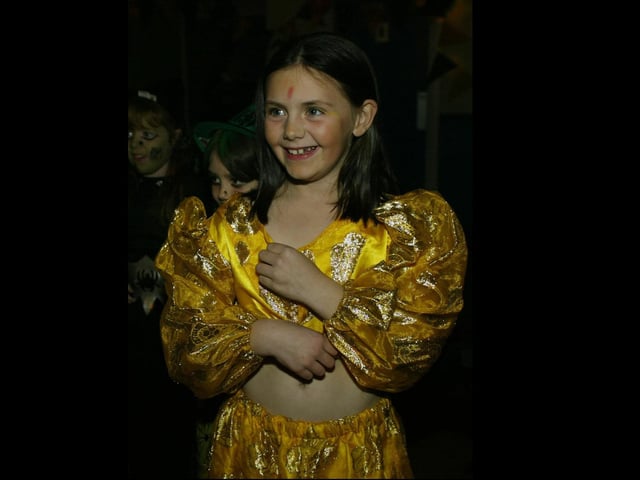 Young people boogying at a Halloween Disco in 2003