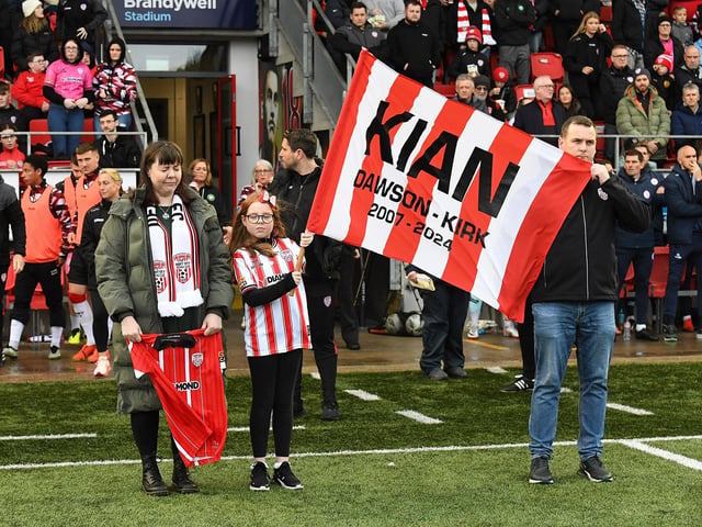The parents and sister of Kian Dawson-Kirk, who was killed in a tragic accident recently, at Derry City’s game against Shelbourne. Photograph: George Sweeney