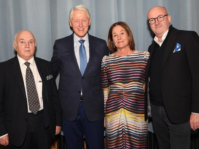 Bill Clinton with guests at the John and Pat Hume Foundation 'Make Hope and History Rhyme' event.