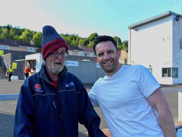 Cork Tom, the League of Ireland’s most travelled fan, pictured with RTE soccer pundit and former Shelbourne player Stuart Byrne at the Brandywell on Friday evening. Photo: George Sweeney. DER2322GS – 143