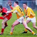 Eoin Bradley takes on the Antrim defence during the 2004 McKenna Cup clash at Glen.