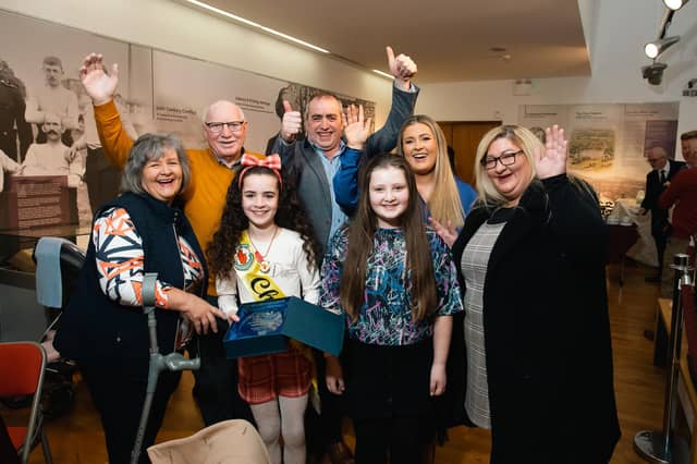 Julie and Patrick McLaughlin celebrating with their grand-daughter Tori, Ulster under-11s Champion, Tori's dad Mark O'Neill, grand-daughter Clara and daughters Stephanie and Marie McLaughlin.