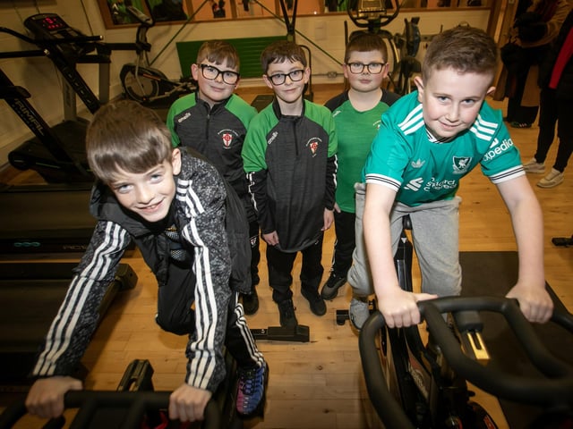 Josh Divin-Toner (St. John's PS) and David Moore (St. Eugene's PS) being put through their paces on the bikes during St. Joseph's Open Night.