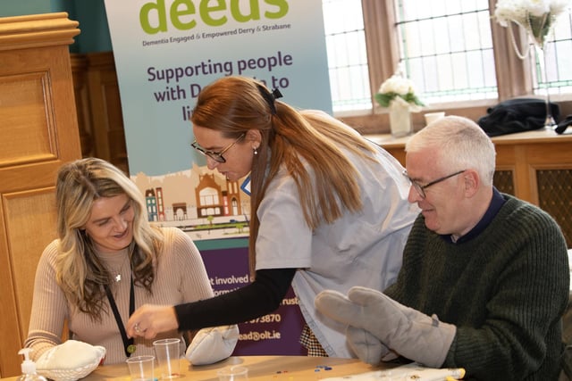 Sabrina Lynch helping out local councillors at Monday's DEEDS event in the Guildhall.