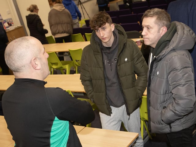 The Foundation's Stephen Parkhouse in conversation with a prospective BTEC student and his father on Thursday night.