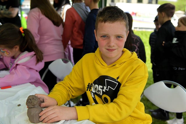 Jacob clay modelling at the NW Migrants Forum’s ‘Celebrate Family – Connect Communities’ fun day at Coshquin on Sunday afternoon last. Photo: George Sweeney.  DER2320GS – 12  