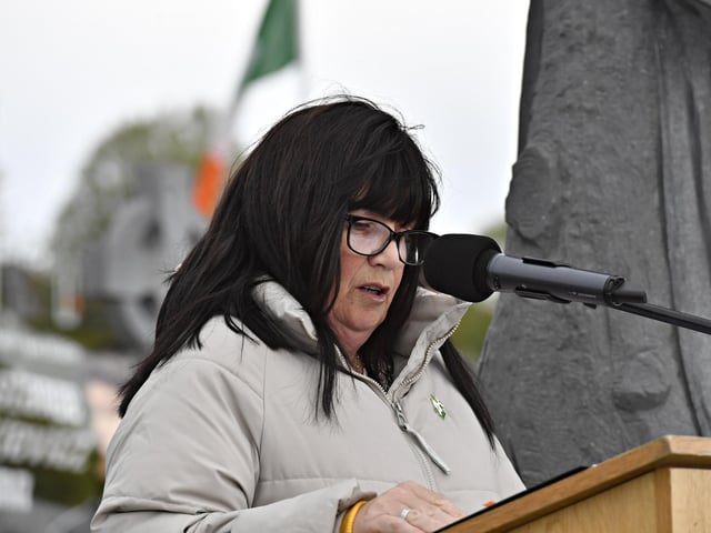 Debbie McKane reads the Derry Republican Roll of Honour at the Republican Plot, in the City Cemetery, during the commemoration of the 109th anniversary of the Easter Rising on Sunday afternoon. Photo: George Sweeney