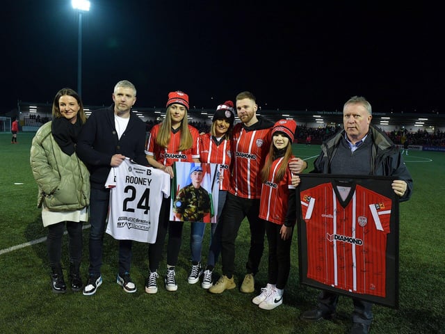 Derry City and Dundalk FC present club jerseys to the family of the late Private Sean Rooney, who was killed in Beirut on 14th December last, before Friday evening’s game. From left to right are Maria O’Connor, Sean O’Connor, chairman, Dundalk FC, Holly McConnellogue, Natasha Rooney McCloskey, Paul McCloskey ,Robyn McCloskey and Philip O’Doherty, chairman, Derry City FC.