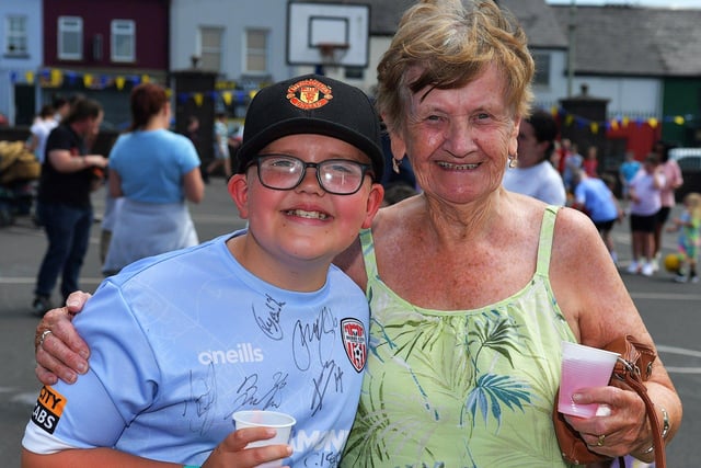 Bobby with is grandmother Agnes at the Long Tower Primary School Family Fun day on Friday afternoon. Photo: George Sweeney. DER2322GS – 107