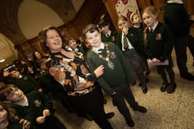 A Greenhaw Primary School tries on the mayoral chain during a visit to the Guildhall.