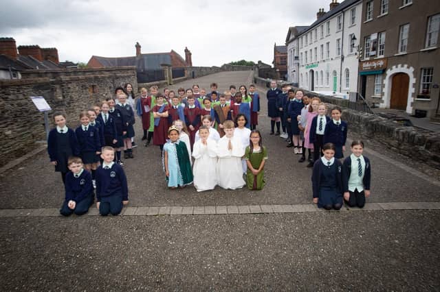 Children from the Long Tower and Fountain Primary Schools who took part in the 'St. Columba' pageant at the Playhouse.