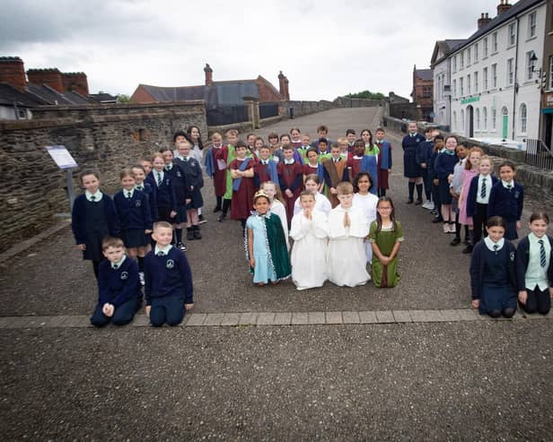 Children from the Long Tower and Fountain Primary Schools who took part in the 'St. Columba' pageant at the Playhouse.