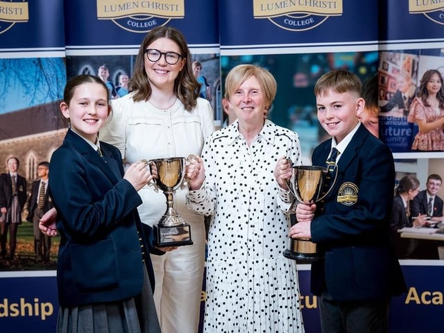 Georgie Hundt and Jim McKeon receiving the Year 8 Pupil of the Year Award from Dr Marie Ferris (Principal) and Mrs Roisin McDermott (Head of Year 8). Stephen Latimer
