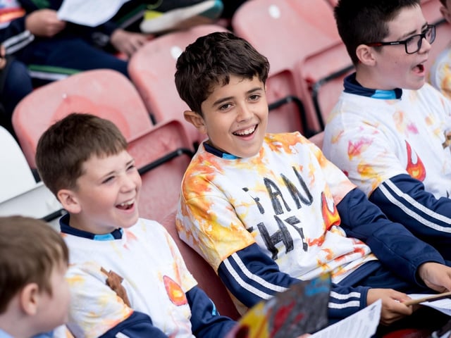 Participants at the Derry Diocese Fan The Flame annual Mass 2025 in Celtic Park.