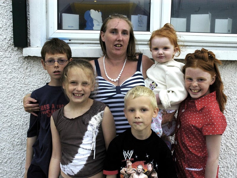Shane and Shelbie pictured celebrating their birthdays with their family from left brother Seamus, Keisha, mum Elaine and sister Darcie.