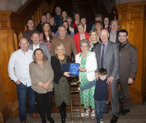 The Mayor of Derry City and Strabane District Council, Sandra Duffy pictured making a presentation to Strabane’s Ursula Melaugh at the Guildhall, Derry on Tuesday evening in recognition of her caring service to the Strabane community. Included are family, friends and work colleagues. (Photos: Jim McCafferty Photography)