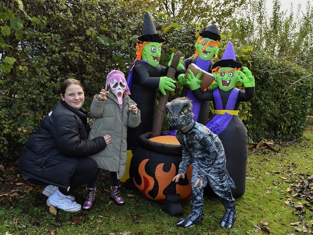 Paige and Amber Elder alongside Jax Thomas at the Autumn Festival with Pumpkin Patch at St Columba’s Primary School, Newbuildings, on Saturday afternoon last. Photo: George Sweeney