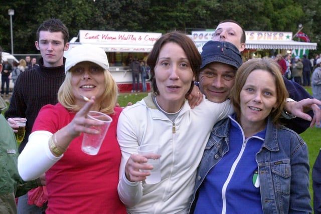 Fans enjoying the Oasis and Ocean Colour Scene concert in September 2002.