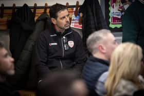 Derry City manager Tiernan Lynch listening intently during Monday's launch at St. Joseph's Boys School.