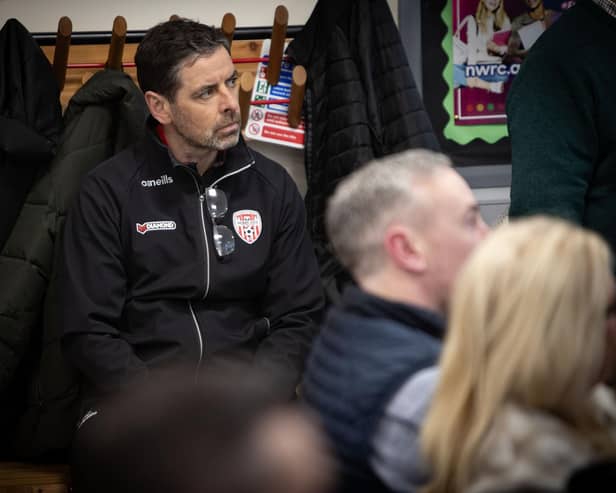 Derry City manager Tiernan Lynch listening intently during Monday's launch at St. Joseph's Boys School.