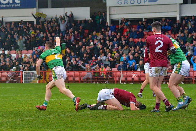 Glen's Cathal Mulholland wheels away in celebration after his goal clinched the Derry Senior football championship final against Slaughtneil in Celtic Park on Sunday afternoon.  DER2243GS – 003