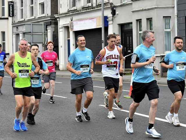 Second Wave runners in the Waterside Half Marathon make their way along Limavady Road. Photo: George Sweeney