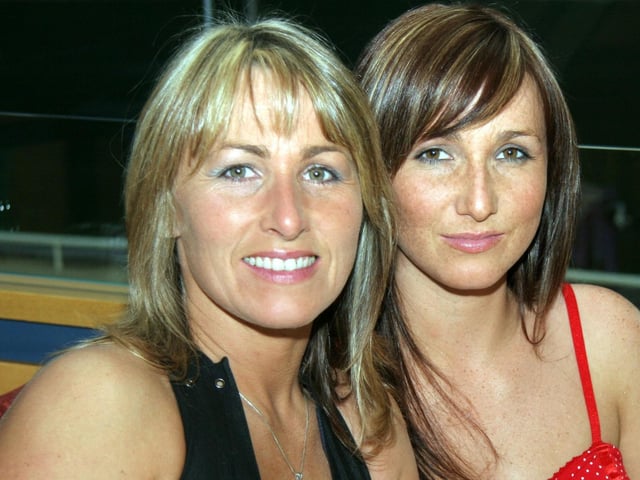 Donna Watson, Linda Olphert pose for the photographer at the Lifford Stadium 0048JML : Parties and celebrations across Derry in May 2006.
