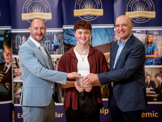 Mr Mark Smyth (Head of Physics) and Mr Fergus O’Donnell (Seagate) congratulates Charlie Mc Closkey, on receiving the Seagate Technology Award for A2 Physics.