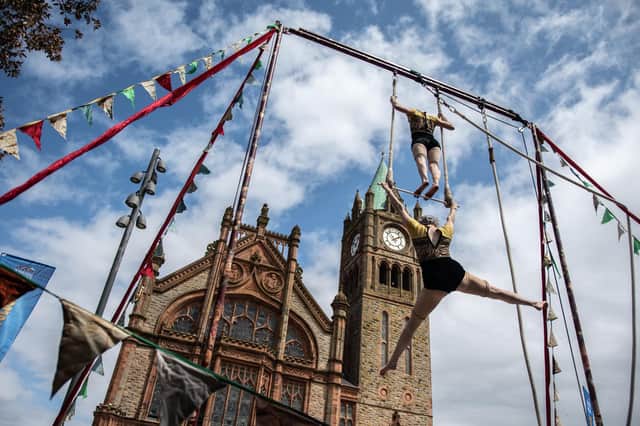 .Doris and Mabel on a trapeze in the Guildhall Square