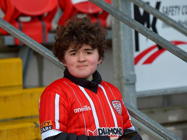 This young Derry City fan spots our cameraman at the game against Finn Harps. Photo: George Sweeney. DER2305GS – 03