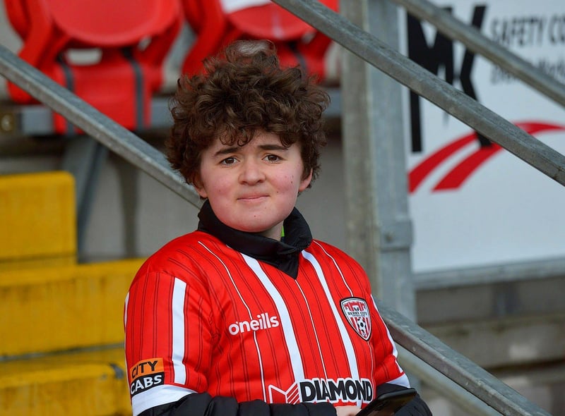 This young Derry City fan spots our cameraman at the game against Finn Harps. Photo: George Sweeney. DER2305GS – 03