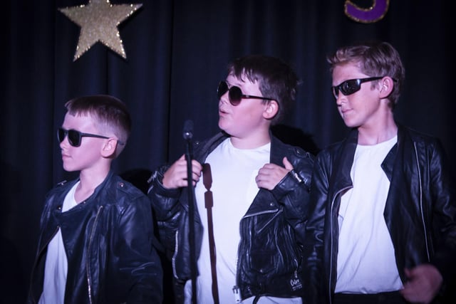 COOL DUDES!. . . . . .P7 boys showed such cool Grease performances on Wednesday last.