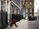 LONDON, ENGLAND - MARCH 15: UK Chancellor Jeremy Hunt leaves Downing Street with the despatch box to present his spring budget to parliament on March 15, 2023 in London, England. Highlights of the 2023 budget are an increase in the tax-free allowance for pensions which the Chancellor hopes will stem the number of people taking retirement, a package of help for swimming pools affected by the increase in energy bills and changes to childcare support for parents on universal credit. (Photo by Dan Kitwood/Getty Images)