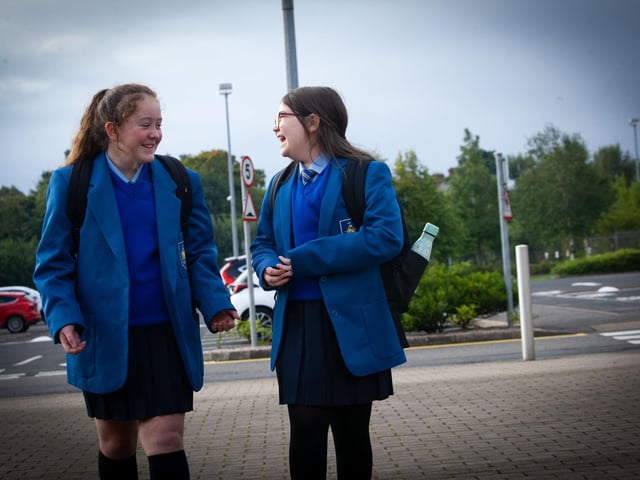 NEW START. . . .  First two arrivals at St. Mary's College on Friday morning former St. Eugene's PS pupil Scarlett Rose Lynch-Coyle and St. Brigid's PS pupil Ava-Marie Gallagher become instant friends. (Photos: JIm McCafferty Photography)