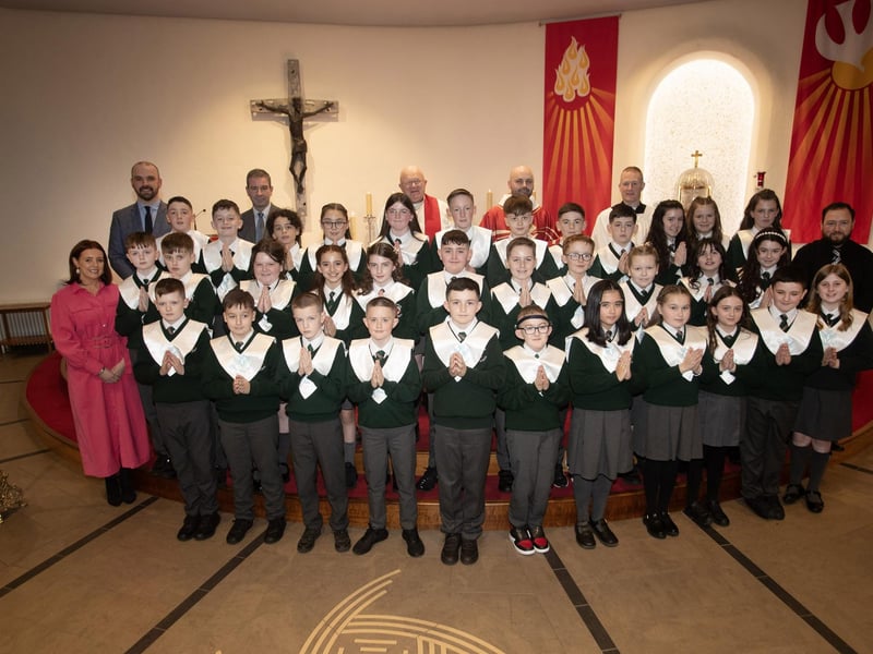 GREENHAW PS CONFIRMATION. . . . .Pupils from Greenhaw Primary School who received the Sacrament of Confirmation from Fr. Chris McDermott at St. Brigid's Church, Carnhill on Thursday last. Included from left are Miss Dara Green, Mr. Kevin Smith, Mr. Sean McLaughlin, Principal, Fr. Michael McGaughey, Fr. Chris McDermott, Fr. Sean O'Donnell and Mr. Christopher Martin. (Photos: Jim McCafferty Photography)
