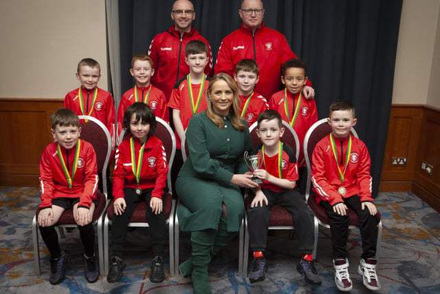 Caroline Casey, manager, O’Neills Sports Superstore, Derry presenting the U8 Championship Summer Cup to Tristar FC at the Annual Awards in the City Hotel on Friday night last. Included are coaches Conor McDevitt and Peter Doherty.