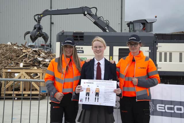Sophie Magee (centre), Lisneal College, along with Kelly McCarter and Andrea Dempsey from Terex Campsie, wearing new Terex workwear designed by Sophie