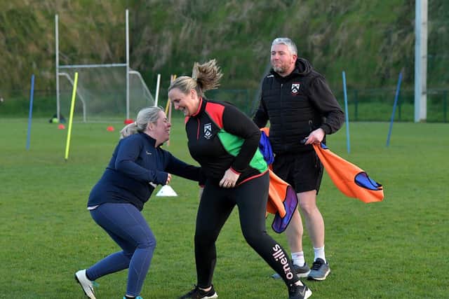 Action from Doire Trasna’s first Mothers and Others football practice session, at Corrody Road. Photo: George Sweeney. DER2316GS – 17